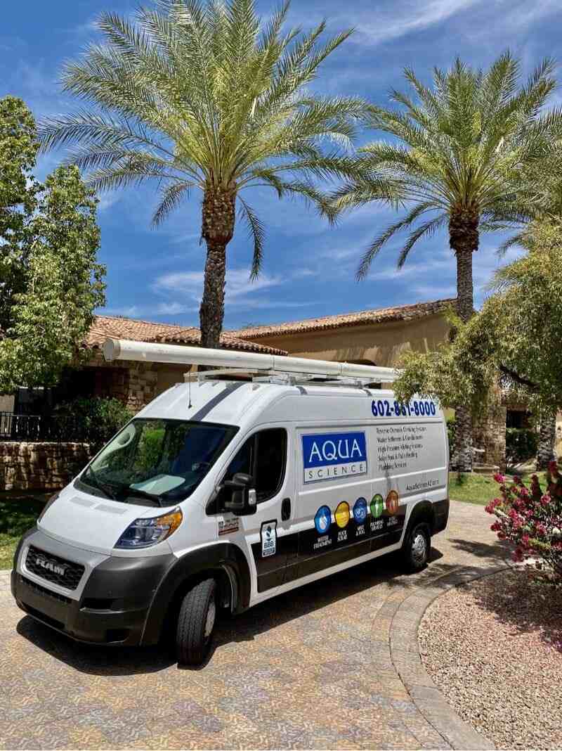 Aqua Science solutions Aqua Science Basebuy's van parked outside the house in Phoenix, AZ.